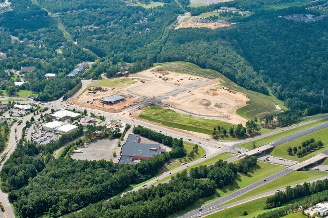 Aerial view of new Stadium Trace Village development shows construction progress